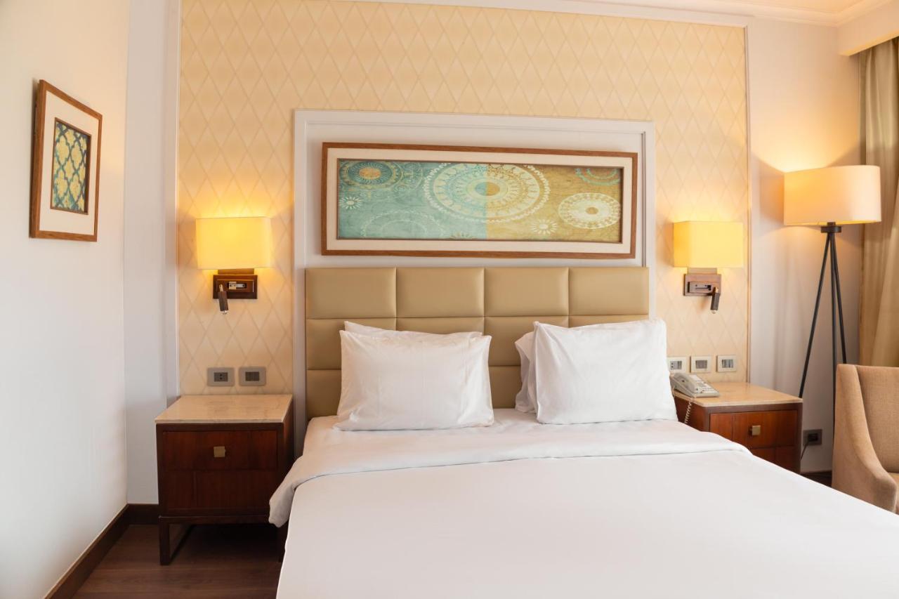 Sharm Dreams Vacation Club - Aqua Park Hotel Bagian luar foto A bedroom at the hotel