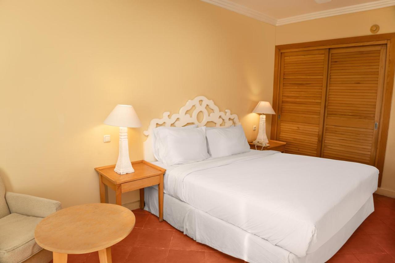 Sharm Dreams Vacation Club - Aqua Park Hotel Bagian luar foto A bedroom
