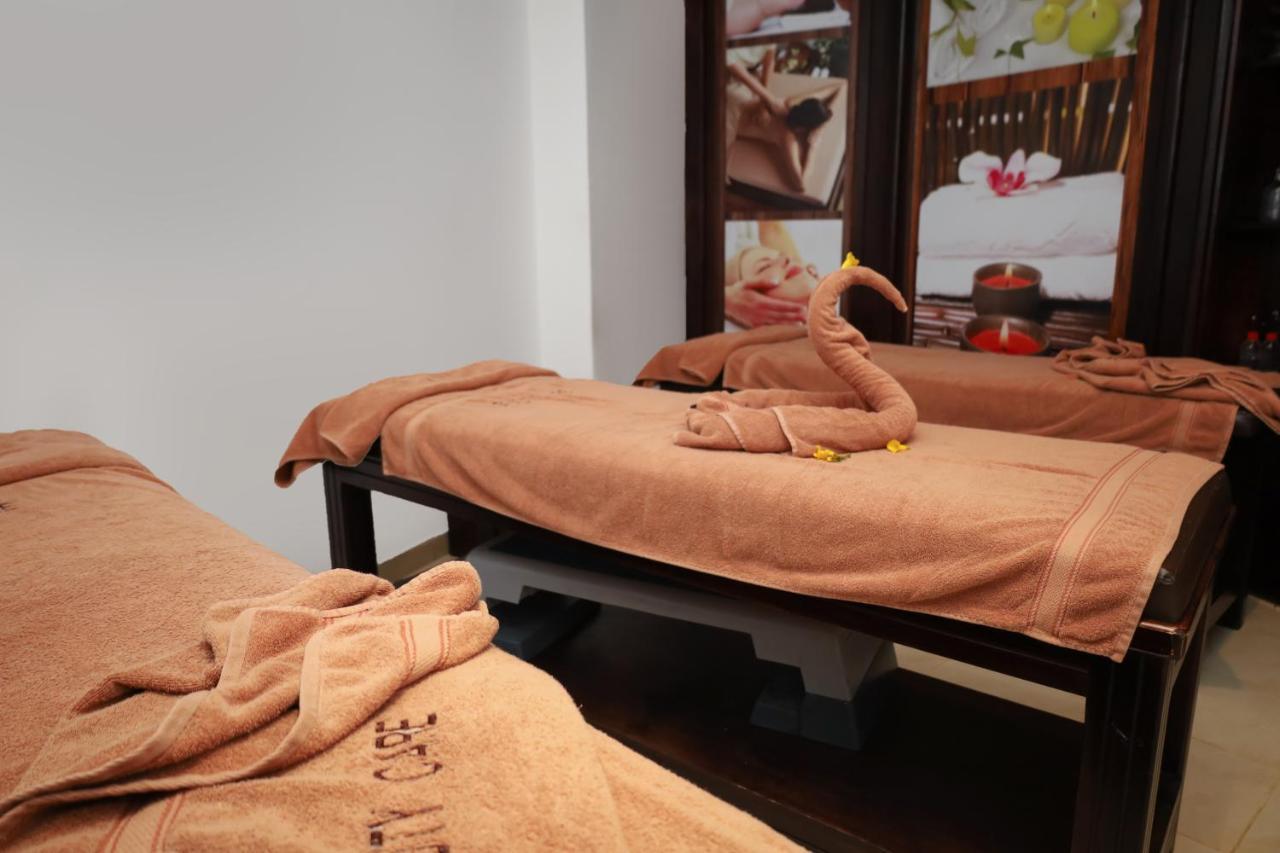 Sharm Dreams Vacation Club - Aqua Park Hotel Bagian luar foto Thai massage beds