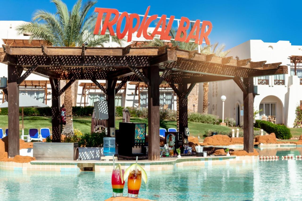 Sharm Dreams Vacation Club - Aqua Park Hotel Bagian luar foto Tropical Bar