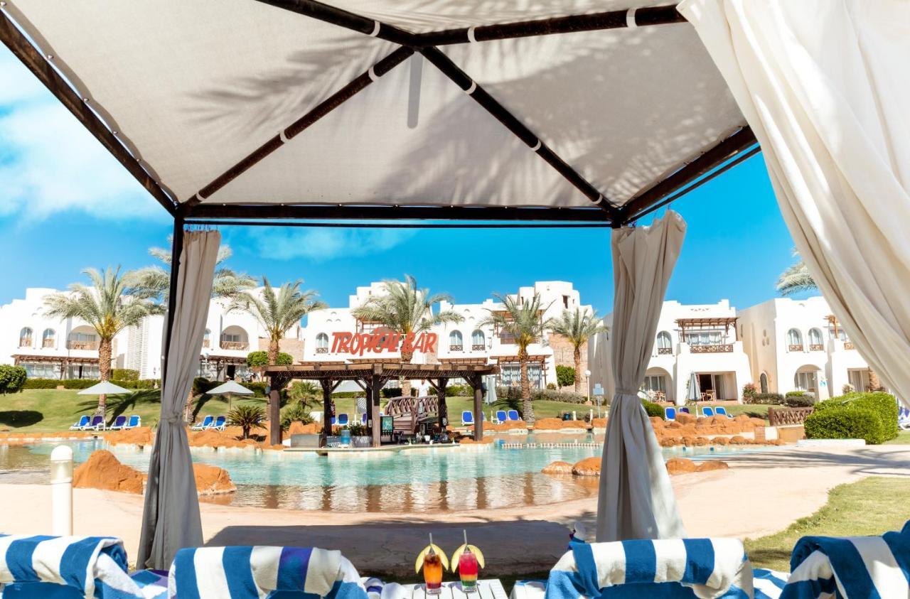 Sharm Dreams Vacation Club - Aqua Park Hotel Bagian luar foto The swimming pool at the hotel