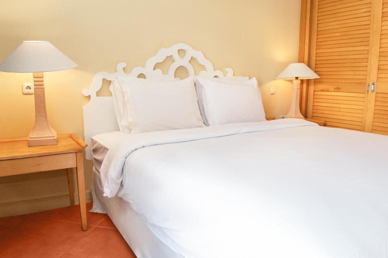 Sharm Dreams Vacation Club - Aqua Park Hotel Bagian luar foto A bed