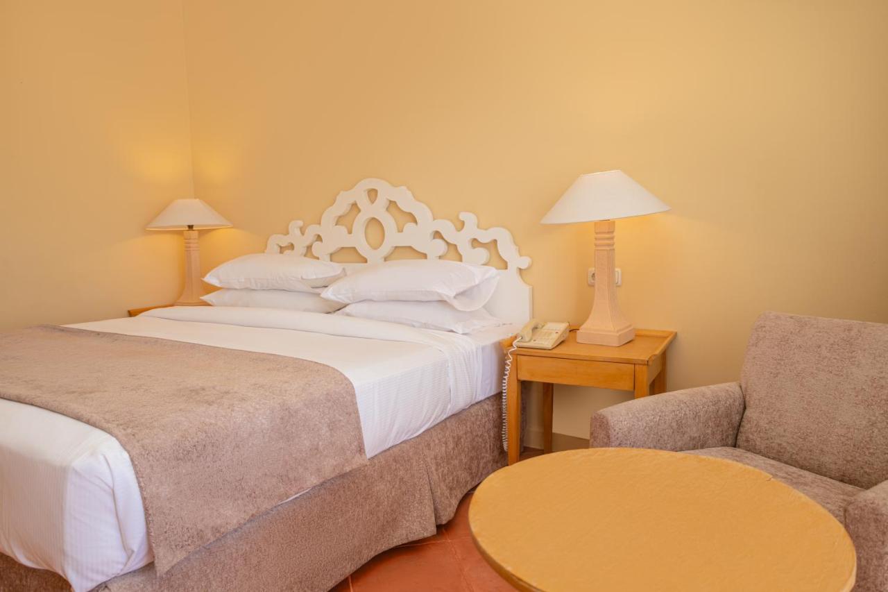 Sharm Dreams Vacation Club - Aqua Park Hotel Bagian luar foto A bedroom at the hotel